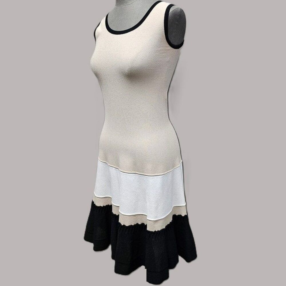 D. Exterior Sleeveless Knit Dress